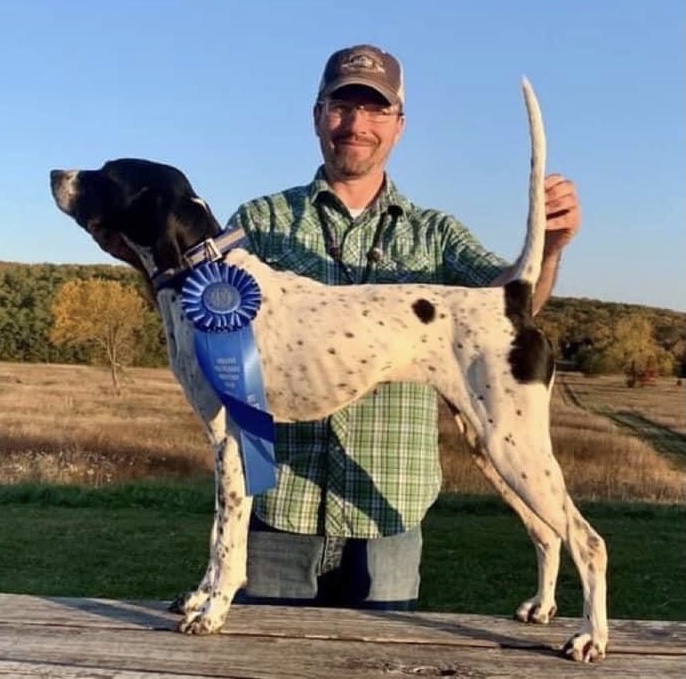 Champion Alliwood's Shady Shay with owner-handler Adam Delude