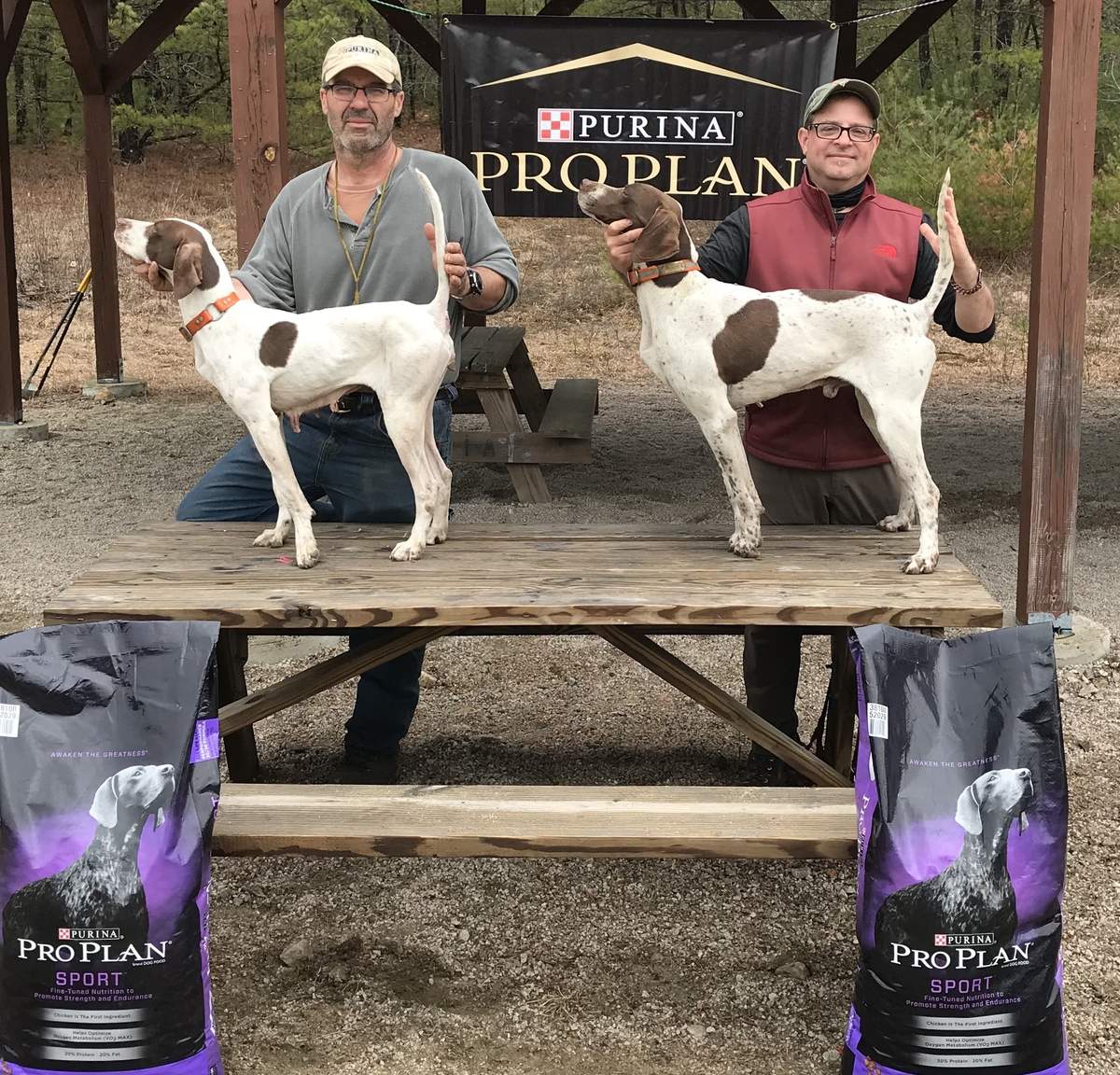 The Winners. From left: John Stolgitis with Chasehill Little Izzy and Robert Ecker with Bo of Piney Woods