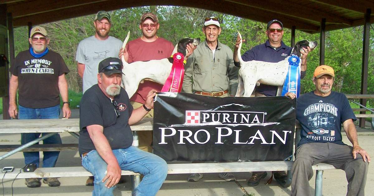 The Winners. Seated: Judge Bill Branham (left) and Jim Cipponeri. Standing, from left,  Brian Wood, Eric Munden, Mark Hughes with Runner-Up Grouse Trails Tuscarora, Dr. George Najor, and Robert Ecker with Glassilaun War Paint, the new champion